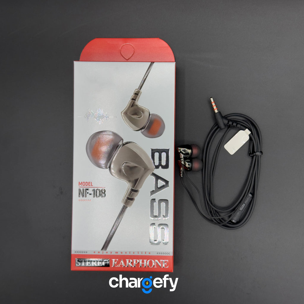 Bass earphones with packaging and cable on a dark background